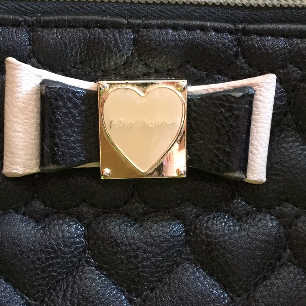 Betsey Johnson’s zippered clutch/change purse